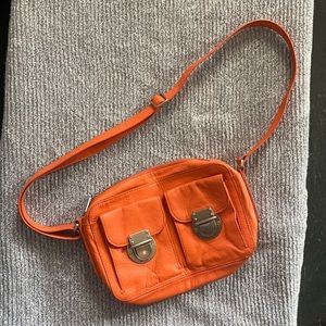 Orange fossil leather purse